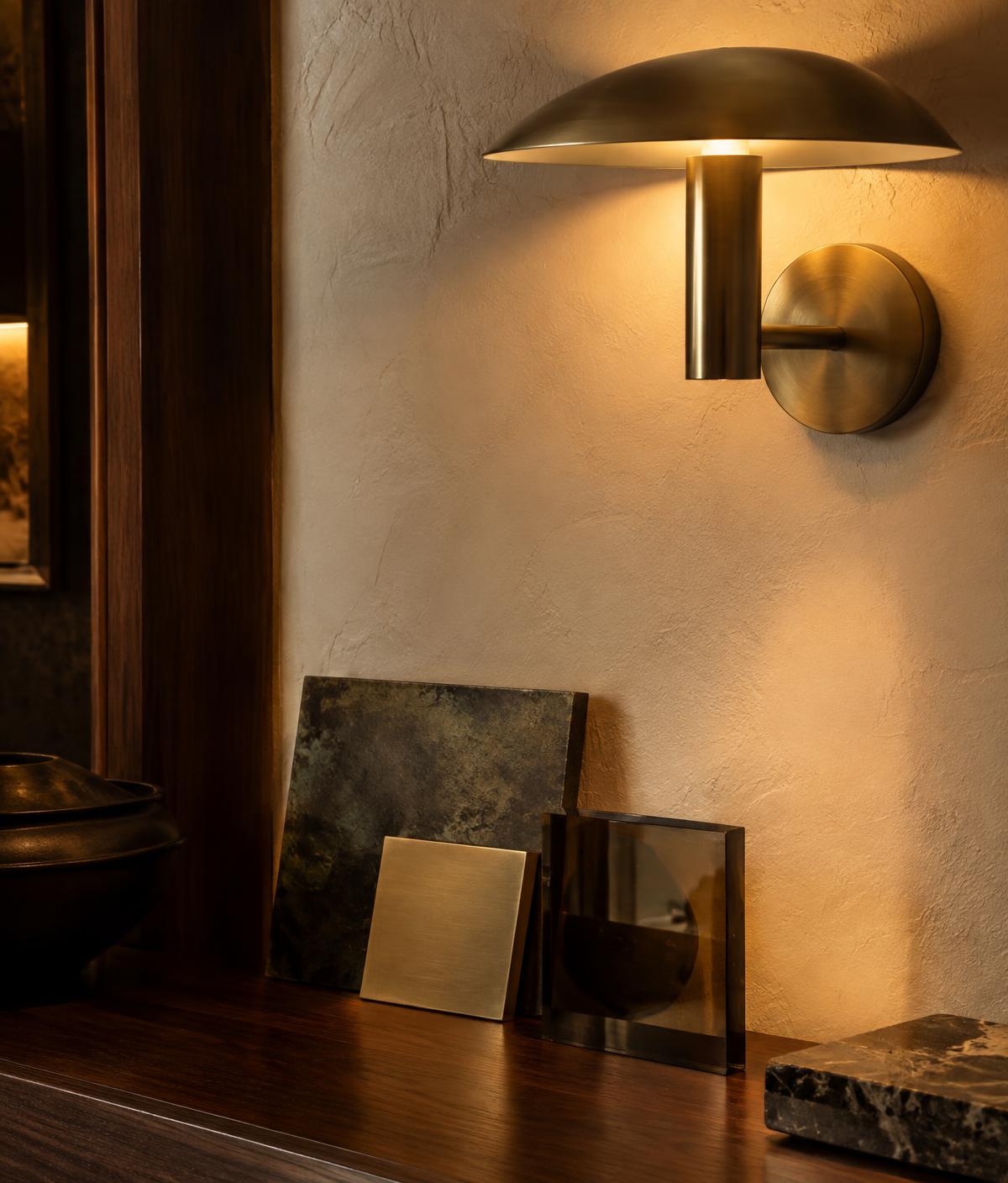 Brushed brass lighting and architectural finish samples