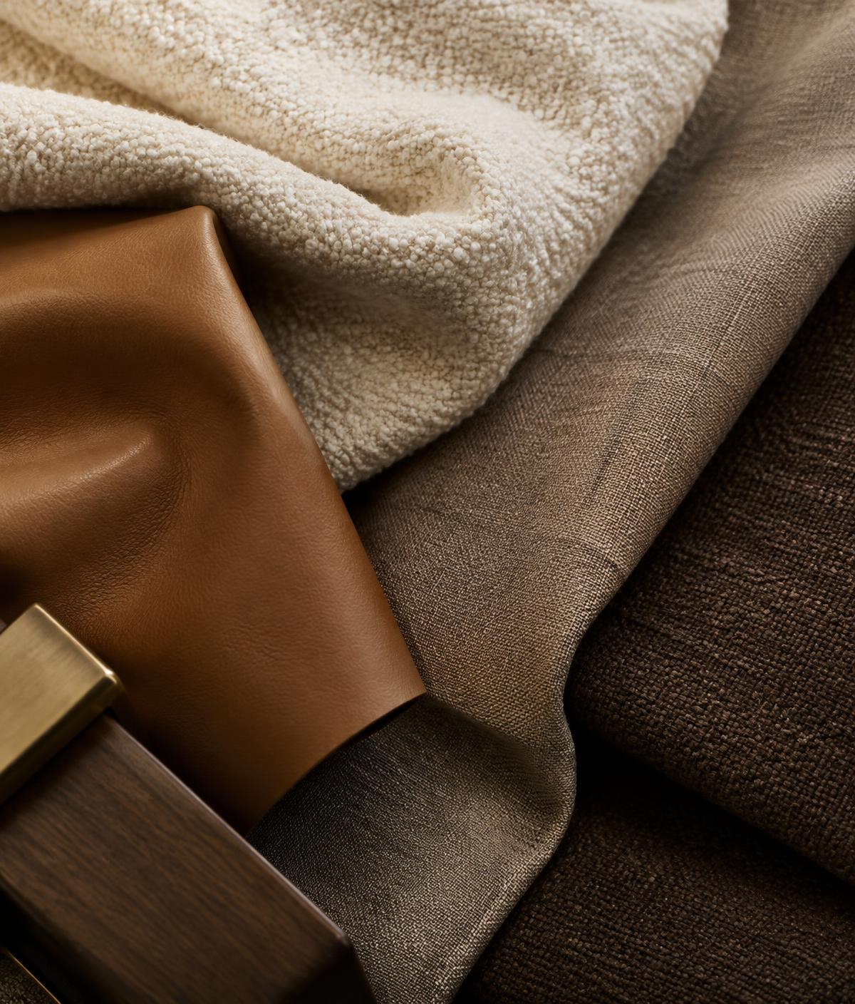 Ivory textiles, caramel leather and woven fabric samples